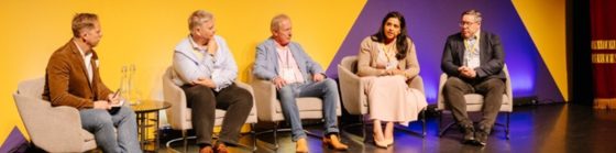 Vidhu speaking on a panel at Small Cells World Summit